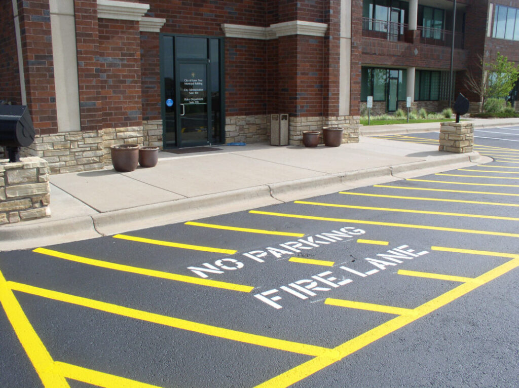 No Limit Sealing - Affordable Driveway Sealing, Interlock Sealing, Garage Ramp Installation, Driveway Extension, Crack Filling, Driveway Painting and Asphalt Maintenance in Vaughan, Richmond Hill, Maple, Markham, Woodbridge, Aurora - Parking Lot Line Striping Painting 4 - Loading Zones & Fire Lanes Parking Markings